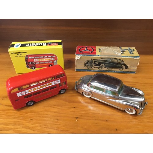 55 - Prameta Mercedes Benz 300 diecast clockwork vehicles boxed with instructions and key, also a Budgie ... 