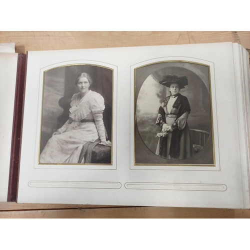 25 - Photographs. Victorian dark morocco oblong album with clasp (defective spine), dec. card leaves, par... 