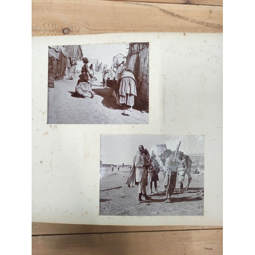 28 - Photographs. East Africa. Rubbed dark morocco oblong quarto album cont. approx. 100 photographs (inc... 