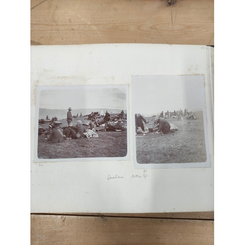 38 - Photographs. South Africa. Military. 8th Hussars. Rubbed dark half morocco oblong album, 