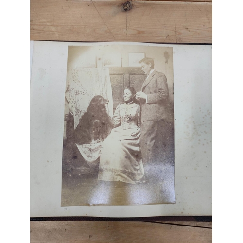 4 - Photographs.  Howard Family. Quarter morocco oblong album containing approx. 100 photographs, variou... 