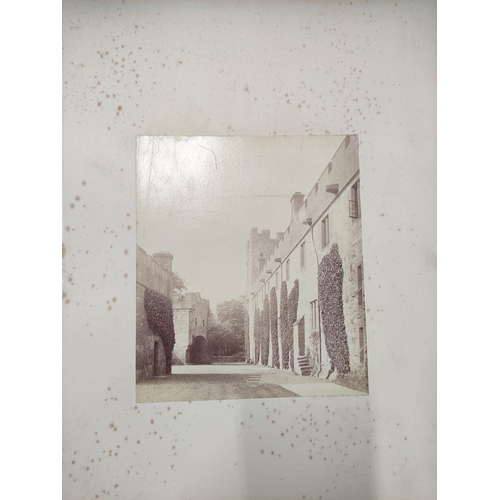 48 - Photographs. Photograph album containing four views of Naworth Castle, possibly taken by George Howa... 