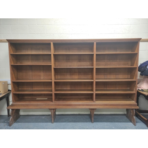 390 - Oak open library bookcase, c.1870's, in the manner of Philip Webb, the moulded pediment above three ... 