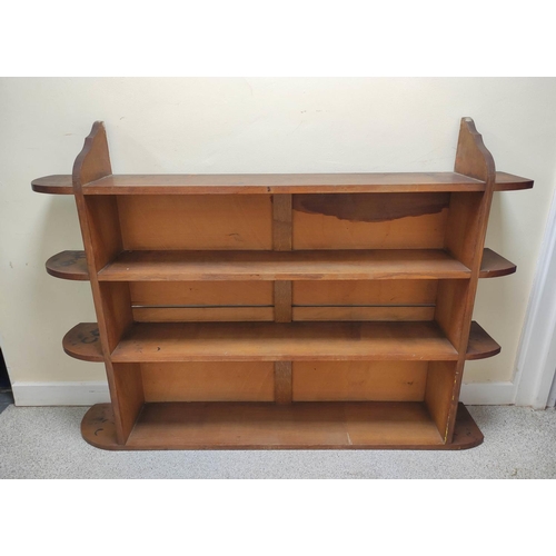 393 - Late 19th century oak open bookcase in the Arts and Crafts manner, the four shelves linked by fret c... 