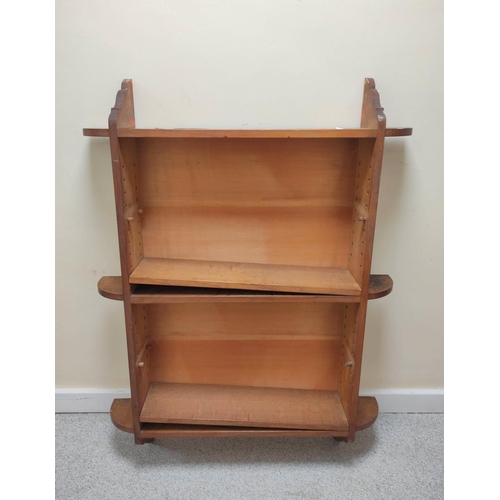 394 - Late 19th century oak wall hanging open book shelves in  the Arts and Crafts manner, adjustable... 