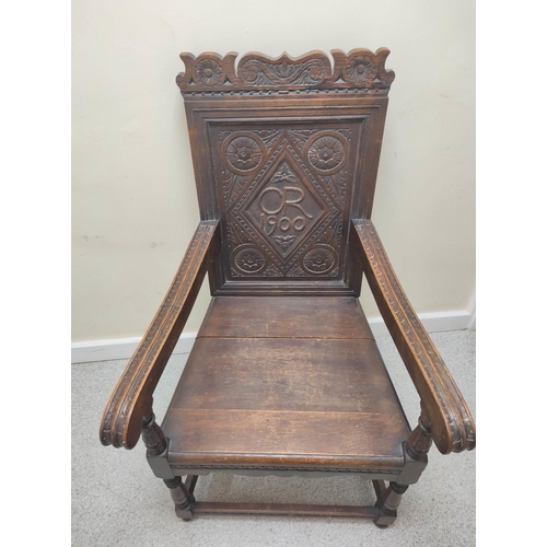 395 - Oak wainscot chair, c.1900, with panel back and solid seat, carved CR 1900 (Charles Roberts MP) and ... 