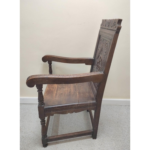 395 - Oak wainscot chair, c.1900, with panel back and solid seat, carved CR 1900 (Charles Roberts MP) and ... 