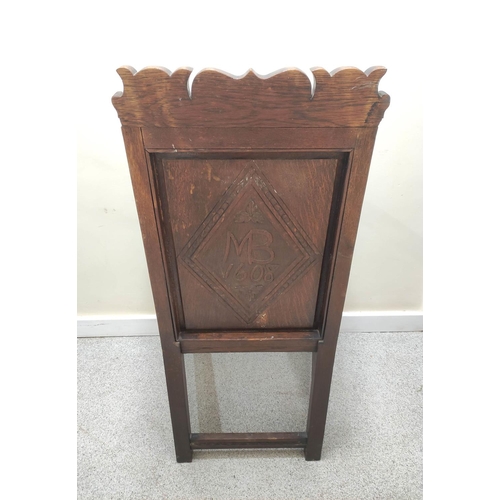 395 - Oak wainscot chair, c.1900, with panel back and solid seat, carved CR 1900 (Charles Roberts MP) and ... 