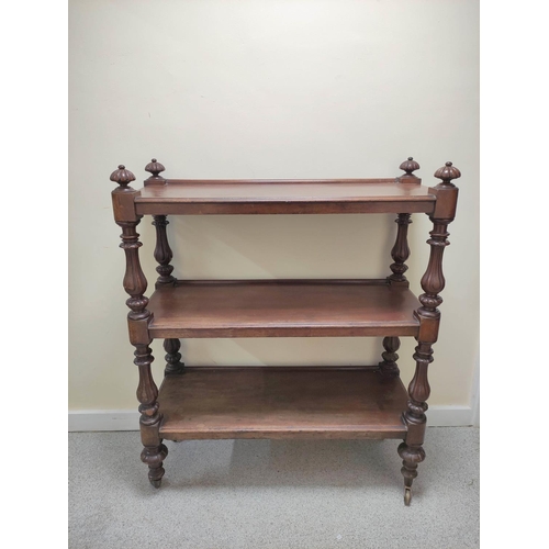 413 - Victorian  mahogany buffet table, with open tiers, on turned columns and reeded finials, on castors,... 