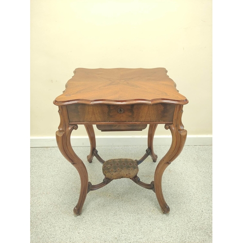 417 - Victorian mahogany sewing/work table, the shaped hinged top enclosing pigeon holes with covers above... 