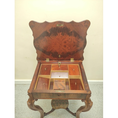 417 - Victorian mahogany sewing/work table, the shaped hinged top enclosing pigeon holes with covers above... 