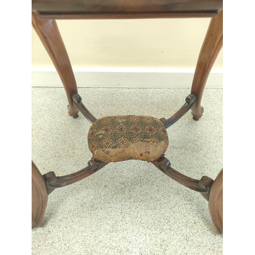 417 - Victorian mahogany sewing/work table, the shaped hinged top enclosing pigeon holes with covers above... 