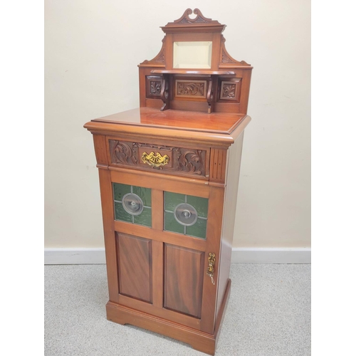 419 - Edwardian mahogany music cabinet with mirrored pediment above a single drawer and door inset with tw... 