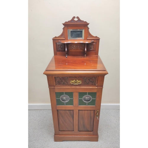 419 - Edwardian mahogany music cabinet with mirrored pediment above a single drawer and door inset with tw... 