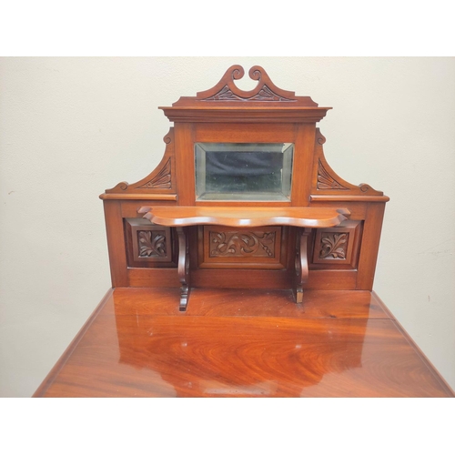 419 - Edwardian mahogany music cabinet with mirrored pediment above a single drawer and door inset with tw... 