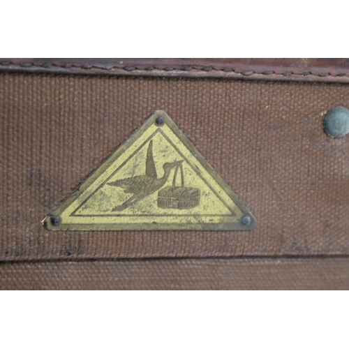 196 - 19th or early 20th century canvas travelling trunk by Liprosta of Dresden with applied triangular st... 