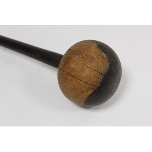 353 - African wooden knobkerrie with large ball knop on tapered shaft, approx. 60cm long.