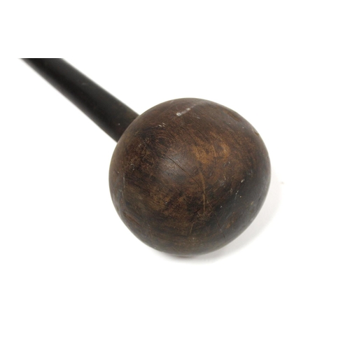 353 - African wooden knobkerrie with large ball knop on tapered shaft, approx. 60cm long.