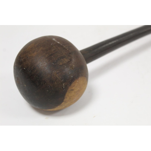 353 - African wooden knobkerrie with large ball knop on tapered shaft, approx. 60cm long.