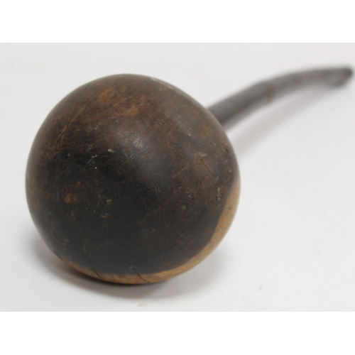 353 - African wooden knobkerrie with large ball knop on tapered shaft, approx. 60cm long.