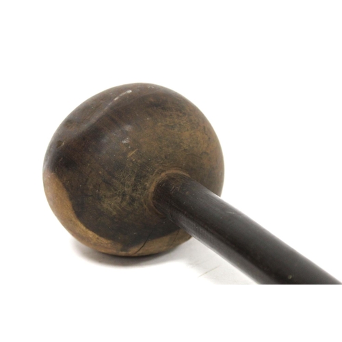 353 - African wooden knobkerrie with large ball knop on tapered shaft, approx. 60cm long.