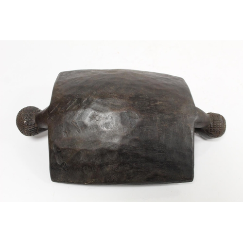 356 - African carved hardwood divination dish of rectangular form with twin mask head handles, surmounted ... 