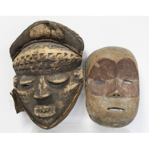 362 - African tribal mask with geometric incised banding to forehead and cheeks, protruding eyelids, nose ... 