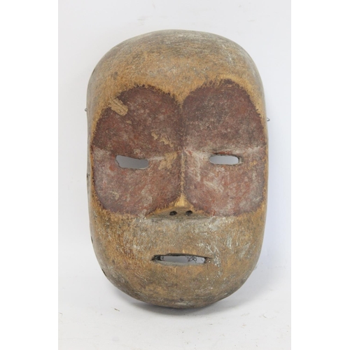 362 - African tribal mask with geometric incised banding to forehead and cheeks, protruding eyelids, nose ... 