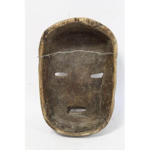 362 - African tribal mask with geometric incised banding to forehead and cheeks, protruding eyelids, nose ... 