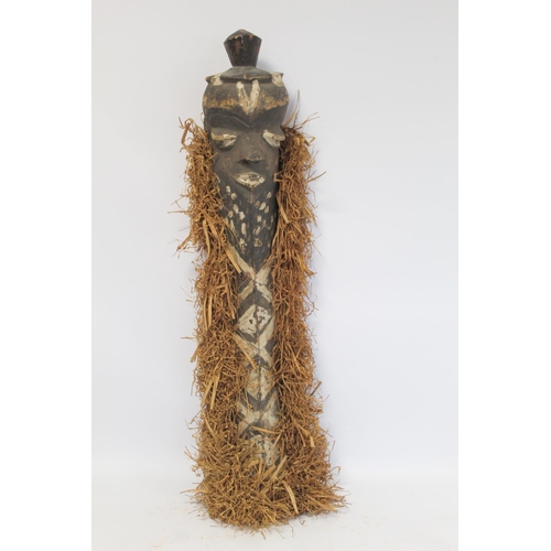 363 - African tribal carved wooden mask of elongated form, with carved and painted facial features, border... 