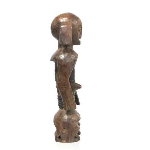 364 - African tribal carved hardwood standing figure, possibly Fang, the torso with cane binding, 33cm hig... 