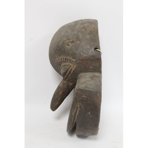 365 - African tribal DRC Soko Mutu Hemba carved mask, 30cm long and another decorated with white and red p... 