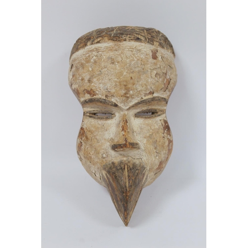 365 - African tribal DRC Soko Mutu Hemba carved mask, 30cm long and another decorated with white and red p... 