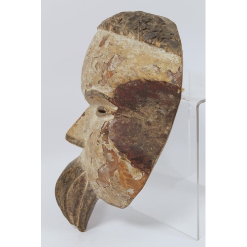 365 - African tribal DRC Soko Mutu Hemba carved mask, 30cm long and another decorated with white and red p... 