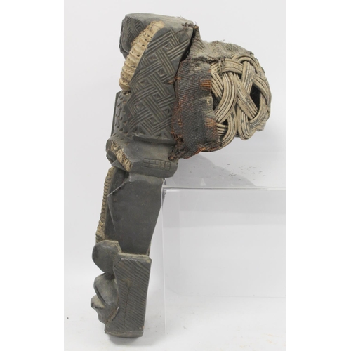 367 - African zoomorphic pierced and carved wooden mask decorated with white pigment, with woven cane and ... 