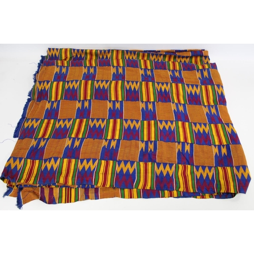 378 - African Asanti Kente cloth in woven silk and cotton fabrics in predominantly blue, yellow, green and... 