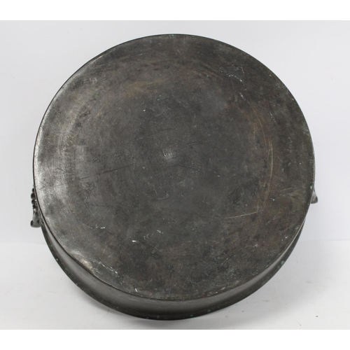 381 - Antique large circular brass skillet with trim turned handles, 38cm diameter. 