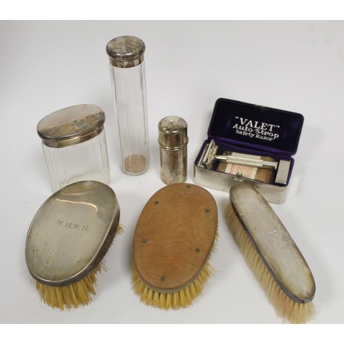 168A - 1920s gentleman's travelling toilette set in fitted leather case, with silver backed brushes, silver... 