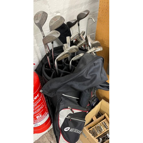 2 sets of golf clubs & bags