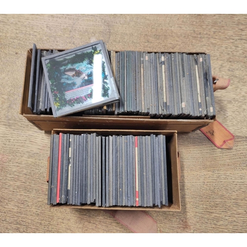 80 - Two boxes of approx 119 mixed monochrome & colour glass slides many by Newton & Co, comprisi... 