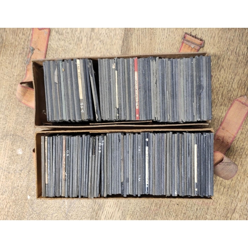 81 - Two boxes of approx 100 mixed monochrome & colour glass slides many by Newton & Co, comprisi... 