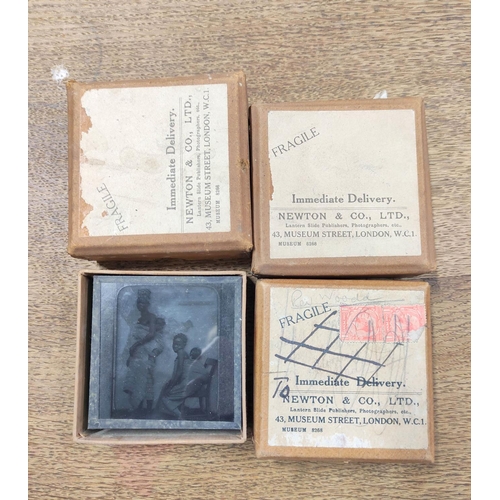 82 - Four cartons of 38 mixed monochrome & colour glass slides including religious and moral subjects... 