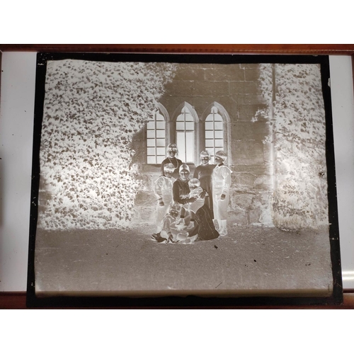 87 - Box of glass photographic negatives relating to the Howard family, some depicting Rosalind Howard &a... 