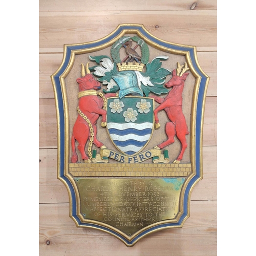 72 - A presentation carved painted wooden armorial plaque to Charles Henry Roberts, 4th November 1953, ma... 