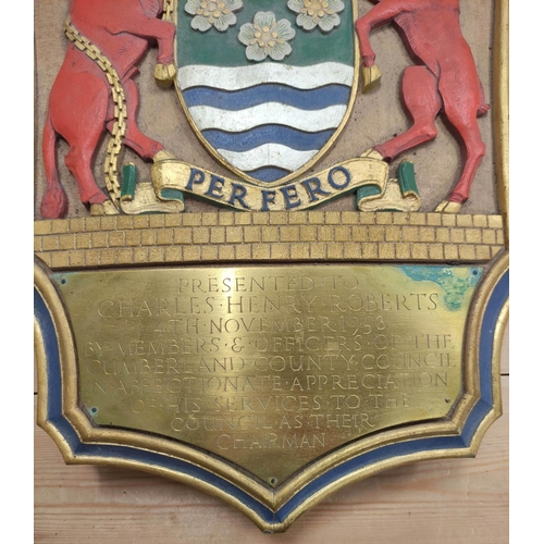 72 - A presentation carved painted wooden armorial plaque to Charles Henry Roberts, 4th November 1953, ma... 