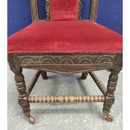 388 - Set of ten 19th century dark oak carved dining chairs with scrolled top rails, pierced padded backs,... 