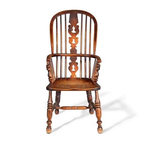 406 - Ash and elm Windsor armchair, the hoop frame with spindle back and pierced splat, raised on turned s... 