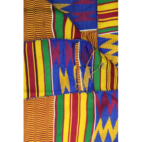 378 - African Asanti Kente cloth in woven silk and cotton fabrics in predominantly blue, yellow, green and... 