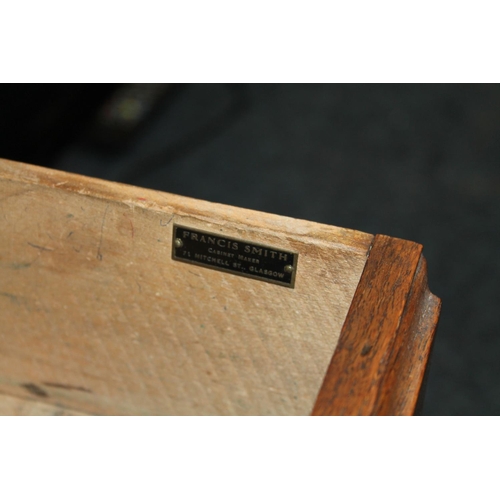 642 - Oak kneehole desk bearing Francis Smith, cabinet maker, 71 Mitchell Street, Glasgow with drop leaf e... 