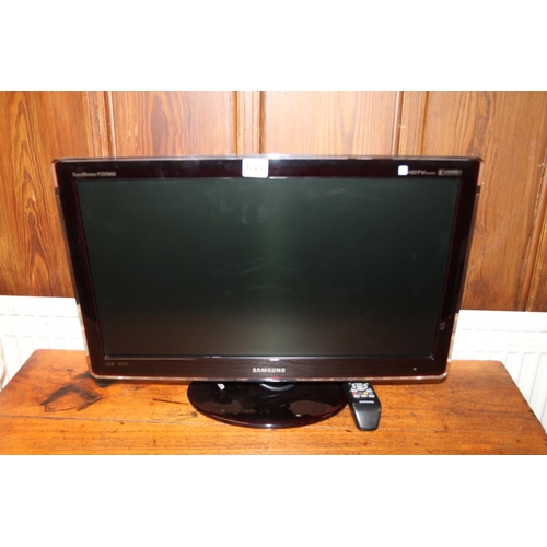 643 - 23'' Samsung flat screen television.